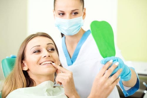 best veneer dentist with patient