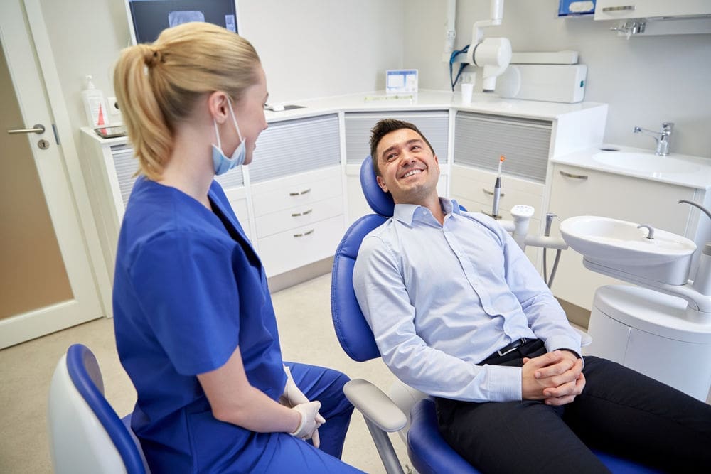 dentists in Lexington MA | dentist with patient